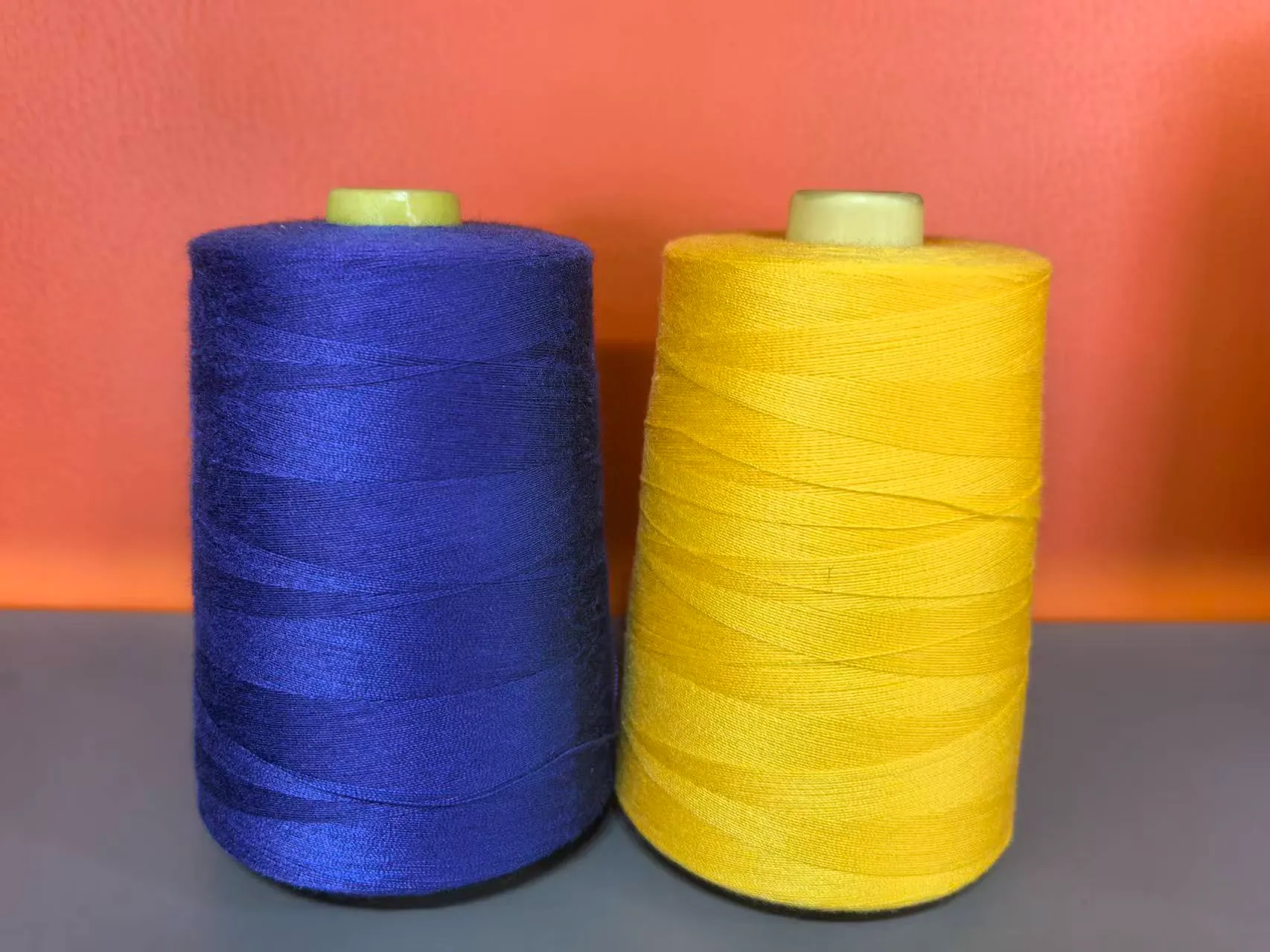 Polyester sewing thread cones for garment manufacturing